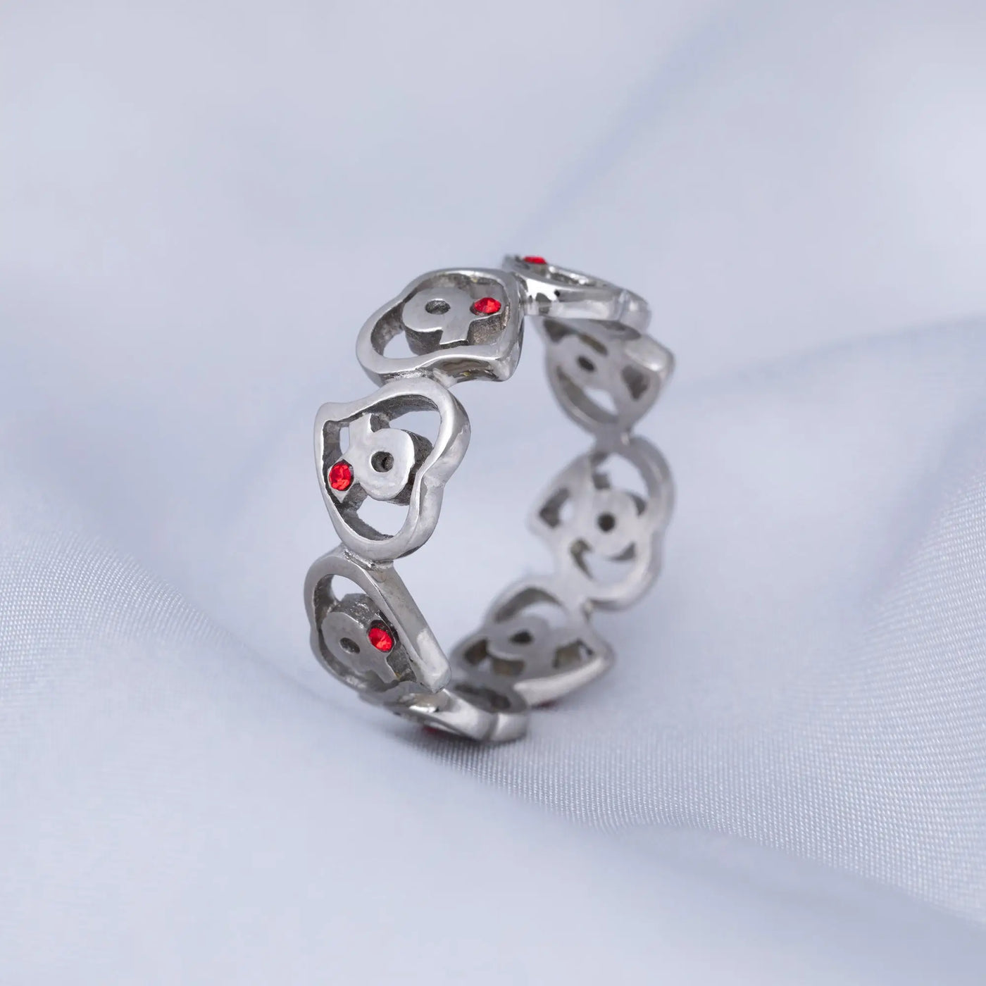 Silver diabetes awareness hearts stainless steel ring with repeating red gemstone skull pattern