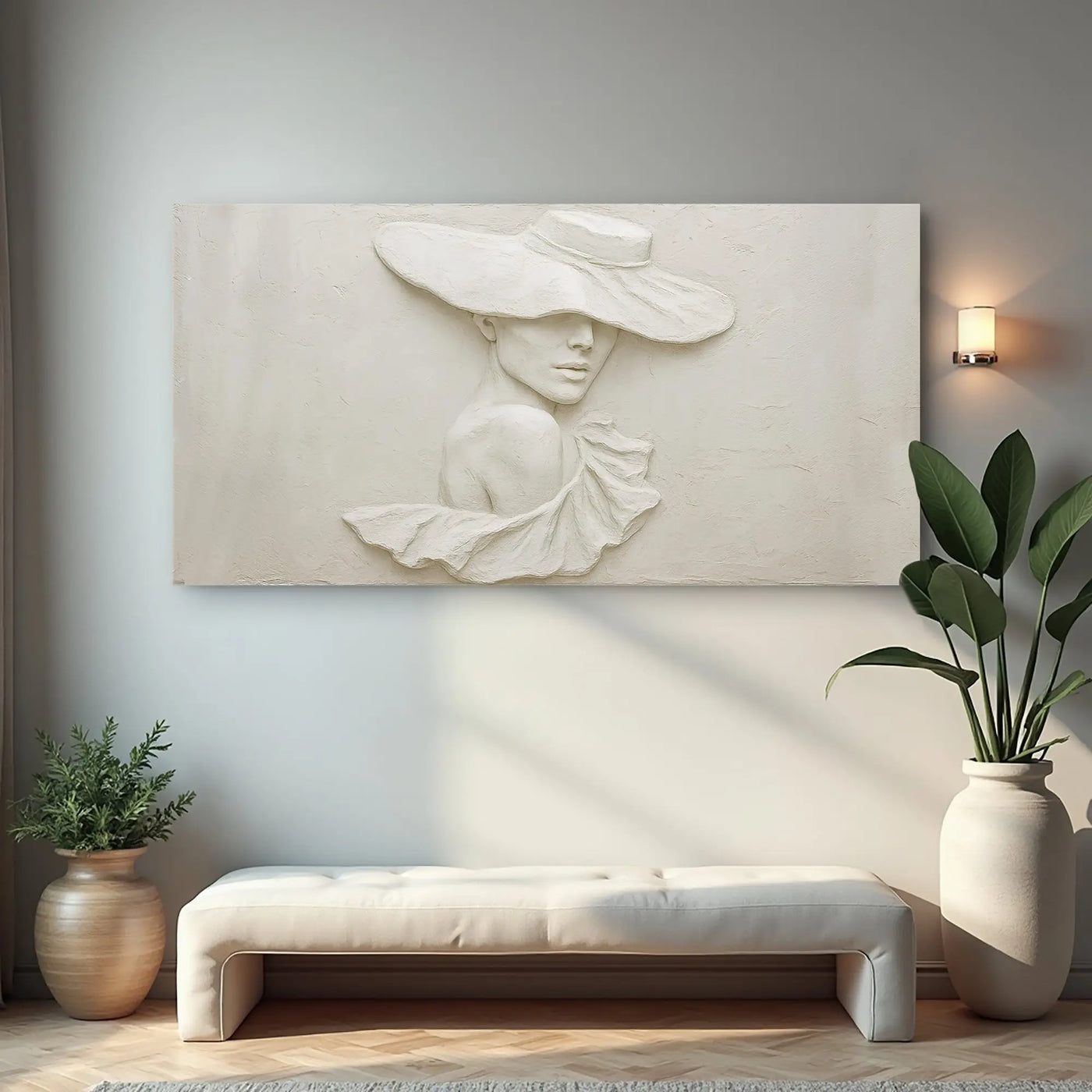 Cream-colored 3d minimalist female portrait wall art featuring a sculptural woman with wide-brimmed hat and flowing fabric detail