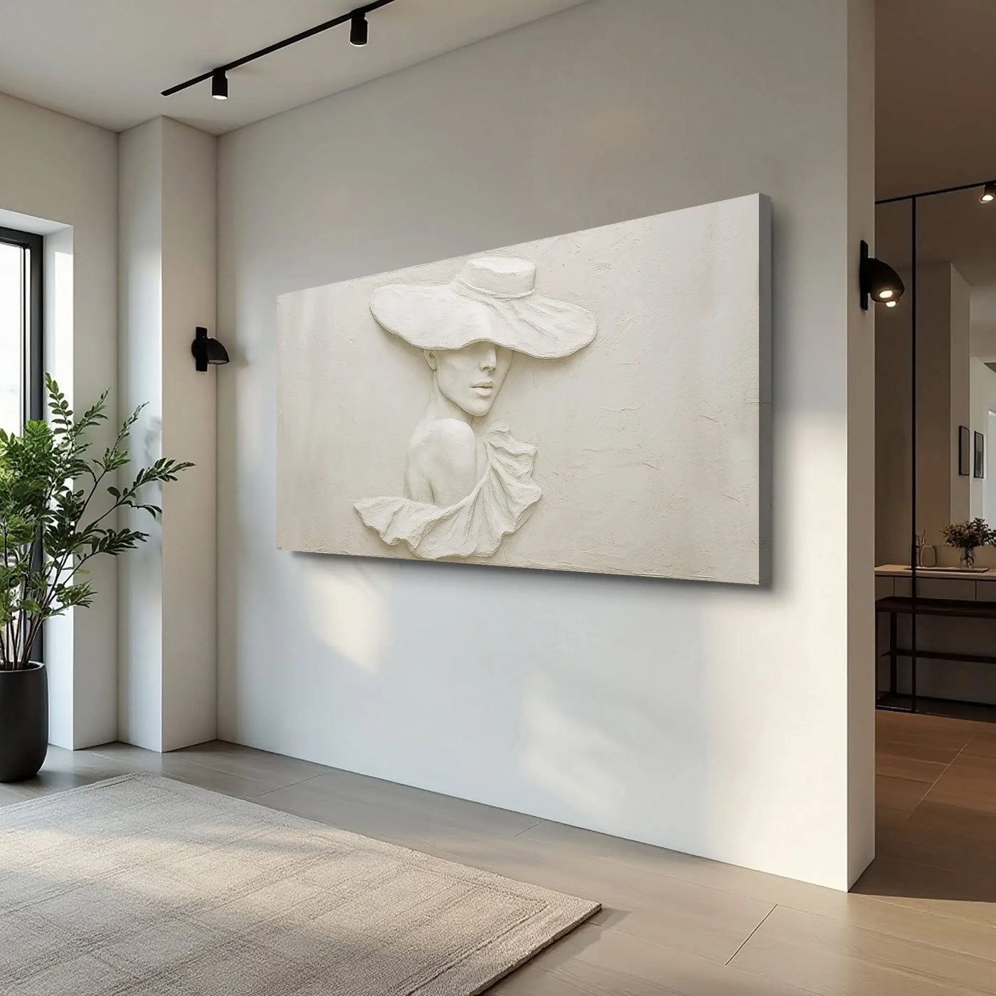 3d minimalist female portrait wall art in white featuring a sculptural woman with a wide-brimmed hat and flowing fabric