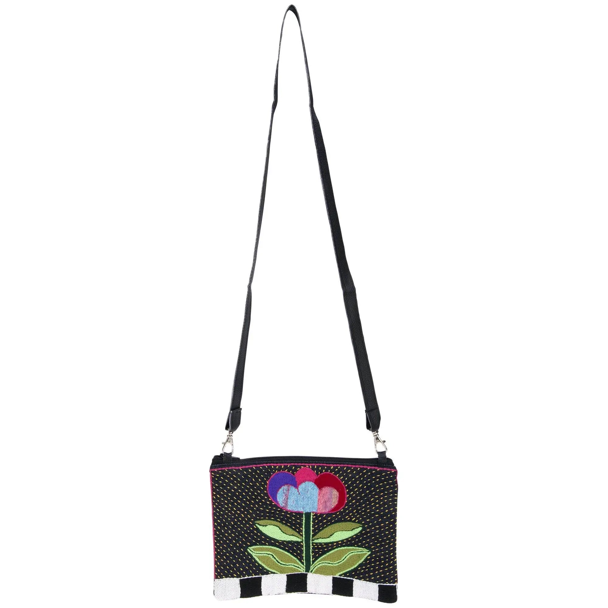 Black Amarasti embroidered sling bag with colorful flower design and striped bottom for casual use