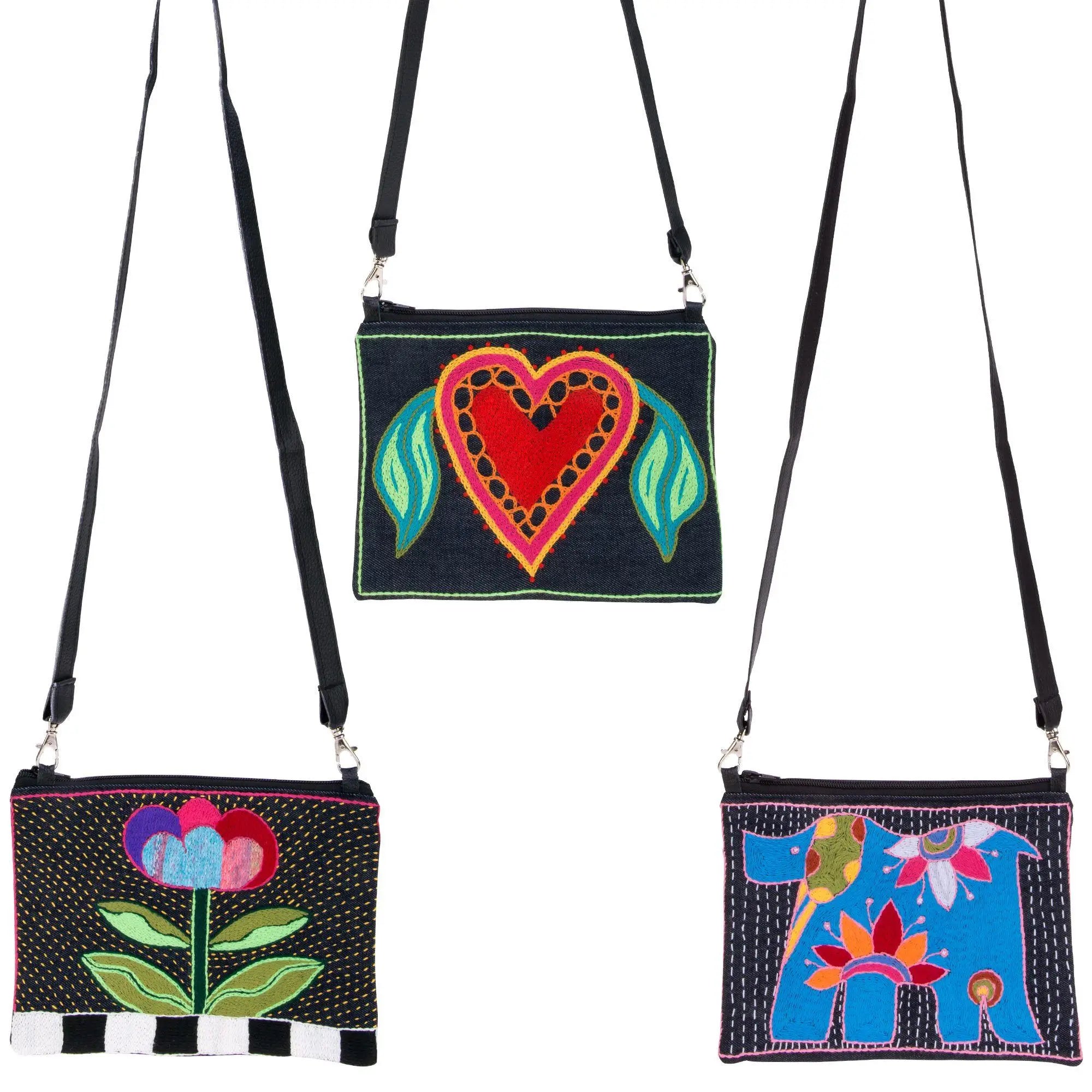 Three amarasti embroidered sling bags with colorful designs on dark fabric and black crossbody straps