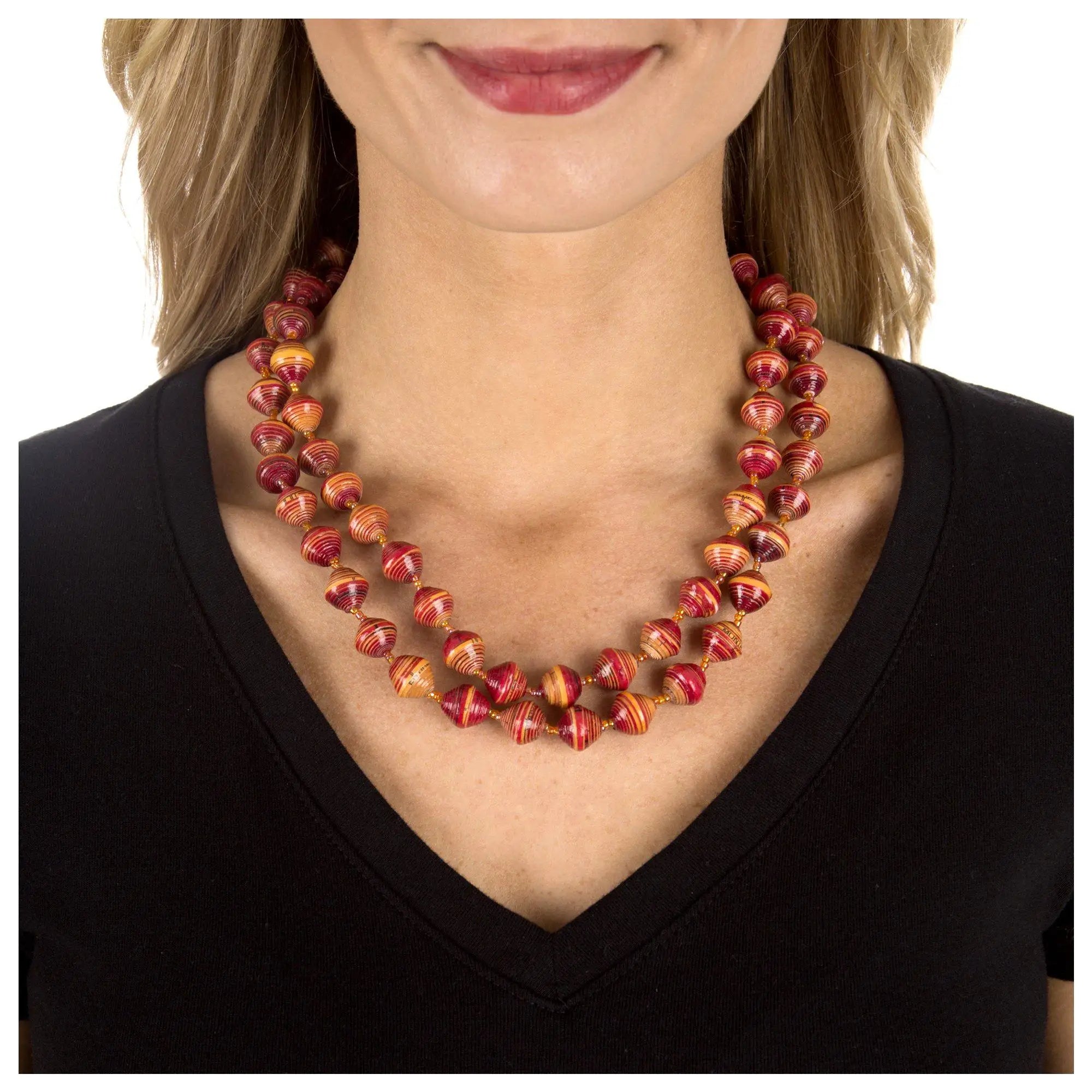 BeadforLife Sanyu long necklace double-strand with handcrafted spiral-patterned beads in vibrant red and orange hues