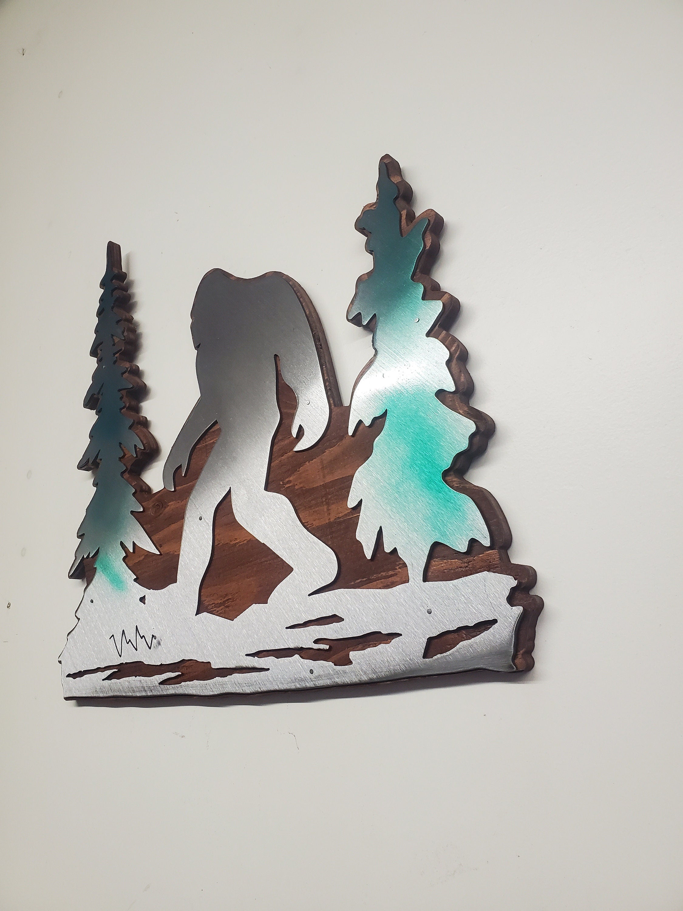 Bigfoot in trees metal art on wood Made in USA