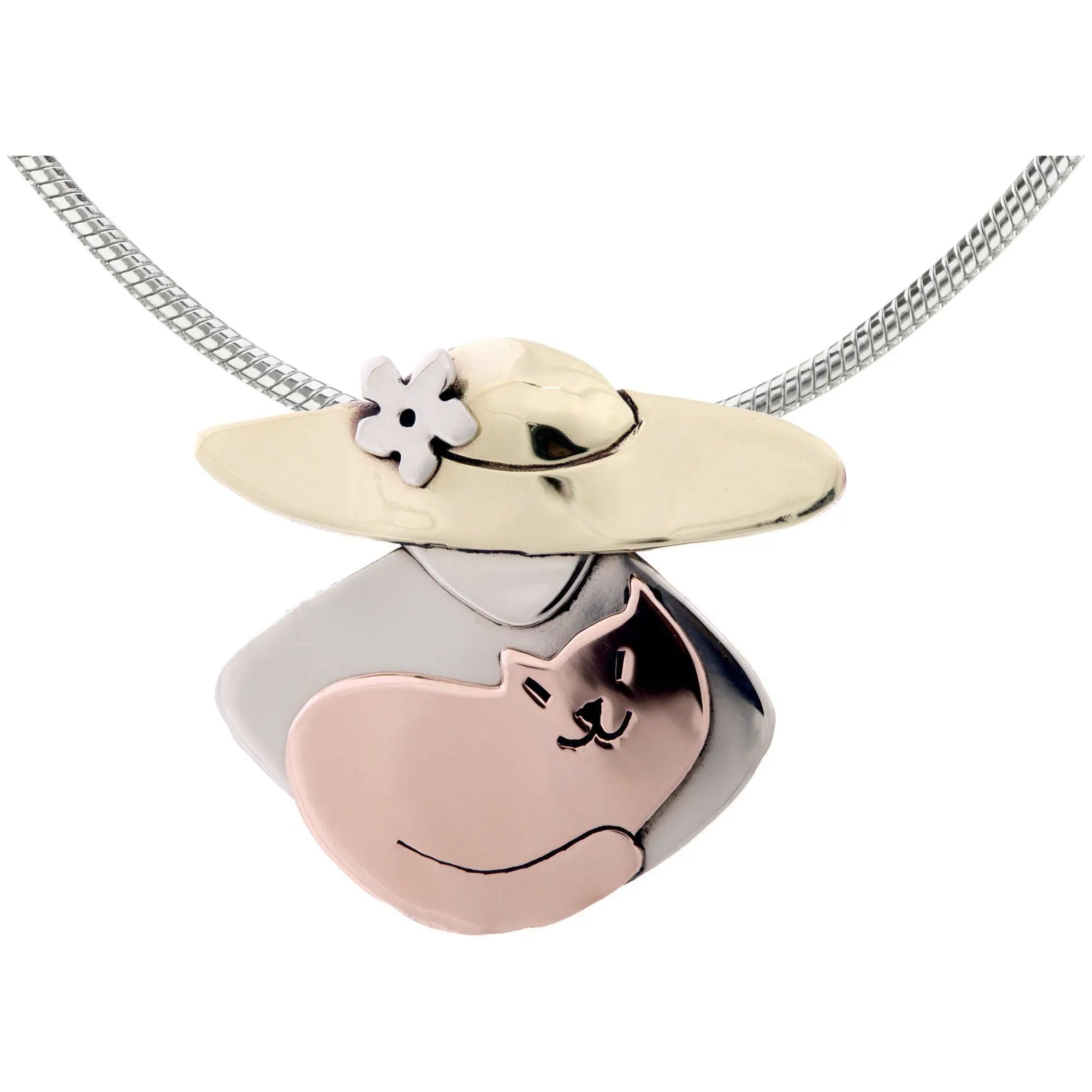 A two-tone cat lover mixed metals necklace with a sleeping cat in rose gold and silver wearing a cream hat with a white flower