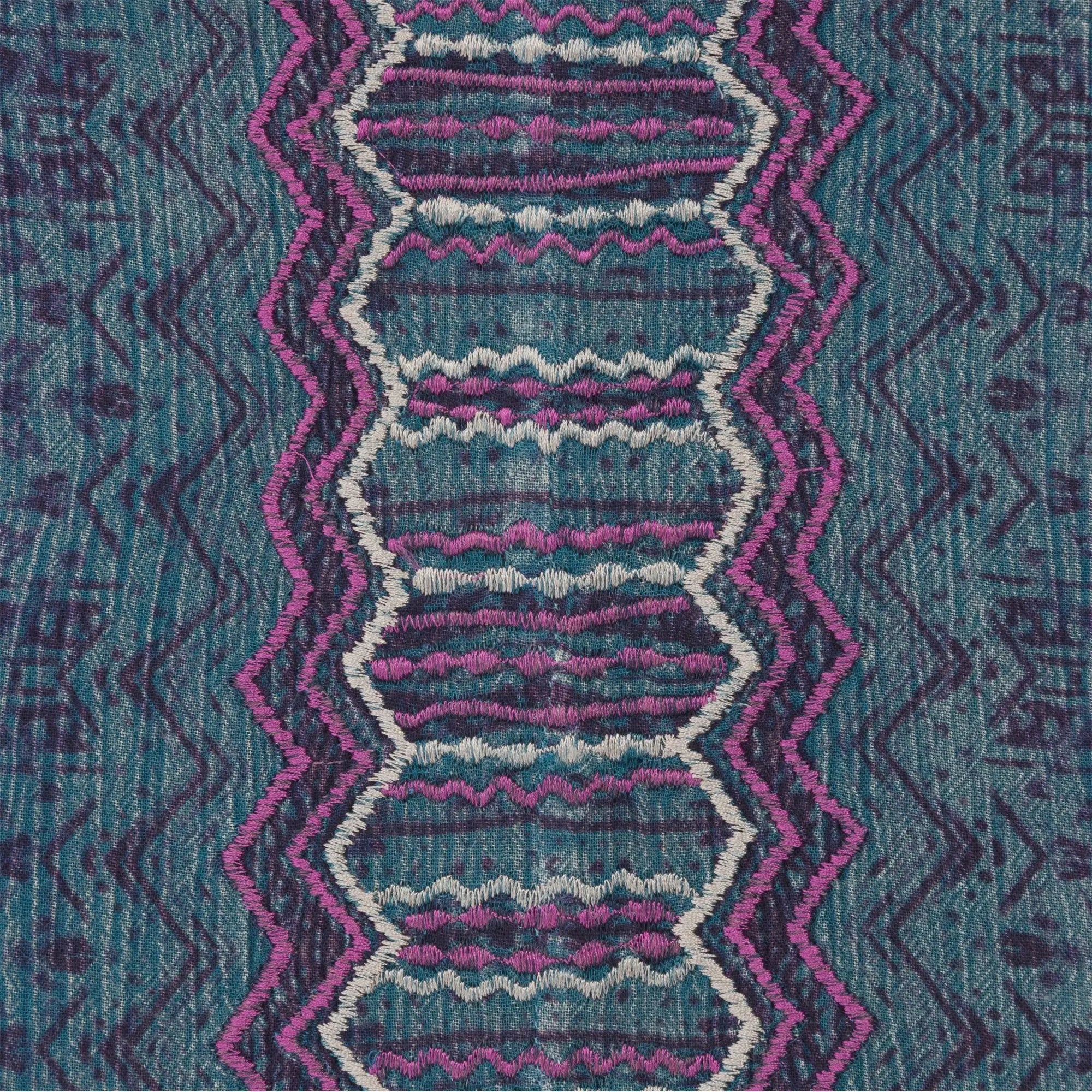 Center Lane embroidered sleeveless tunic in teal fabric with intricate magenta and white zigzag embroidery patterns
