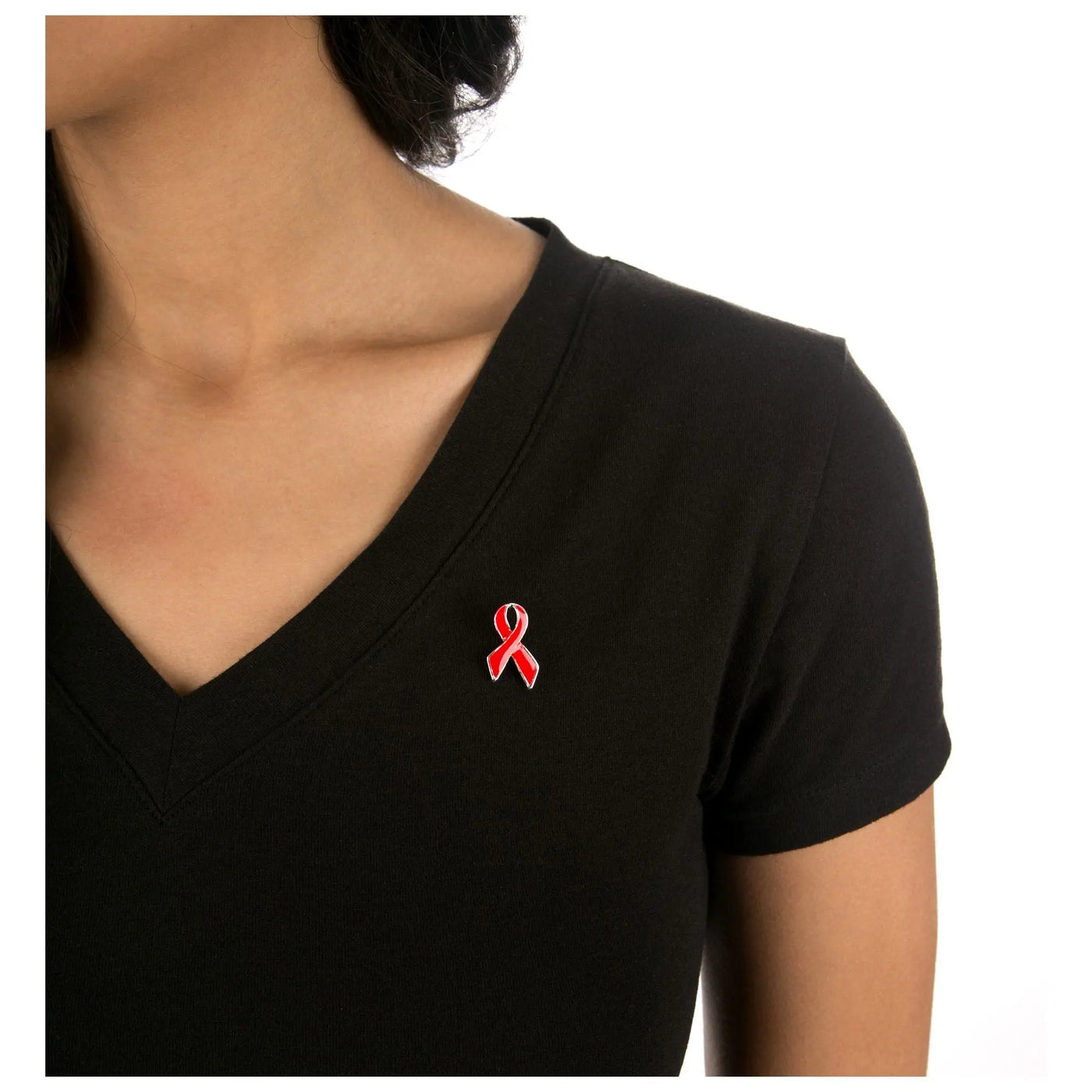 A classic red ribbon lapel pin with a vibrant glossy enamel finish outlined in silver for stylish wear