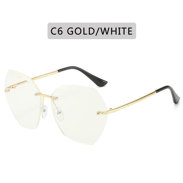 Classic Rimless Sunglasses Women Metal Frame Diamond Cutting Lens Sunglasses For Women New Fashion Black Color New Retro Sun Glasses For Women New Summer Style Sun glasses For Female Famous Style Frames