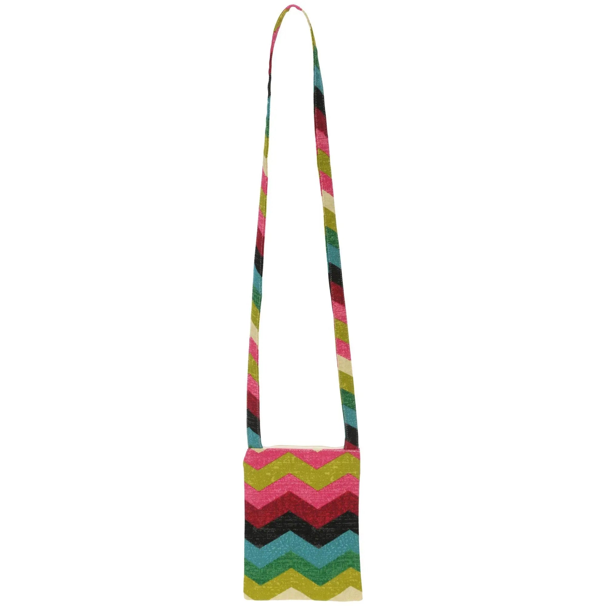 A vibrant cleaver chevron sling crossbody bag with a bold pink green teal and black zigzag woven fabric pattern