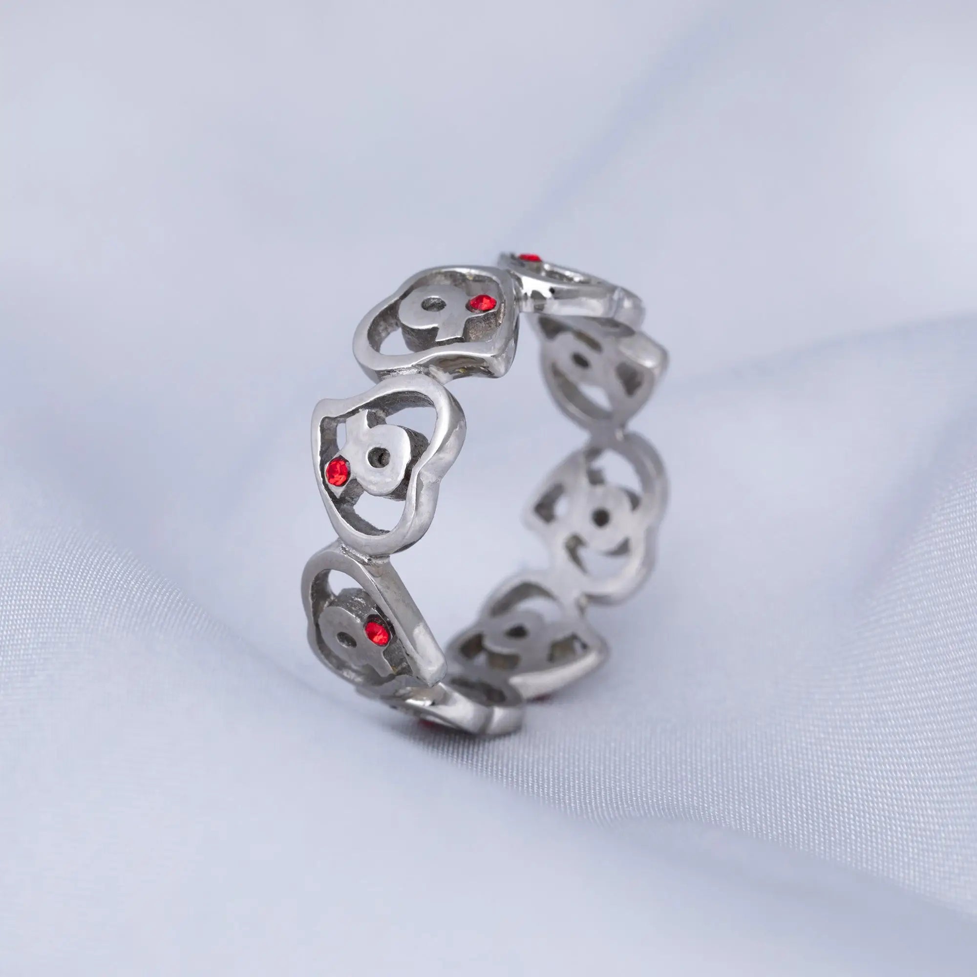 Silver diabetes awareness hearts stainless steel ring with repeating red gemstone skull pattern