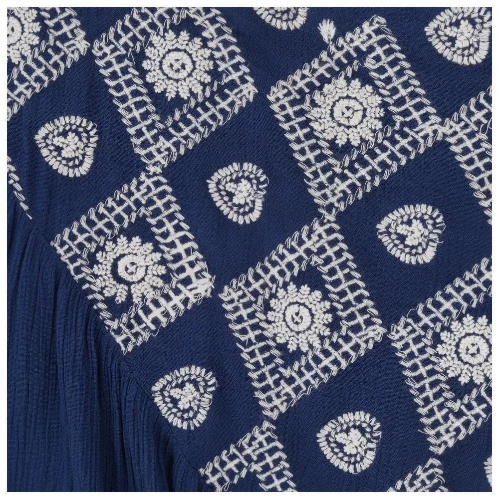 Deep blue diamonds on my sleeve top with intricate white embroidered geometric squares and floral motifs fabric