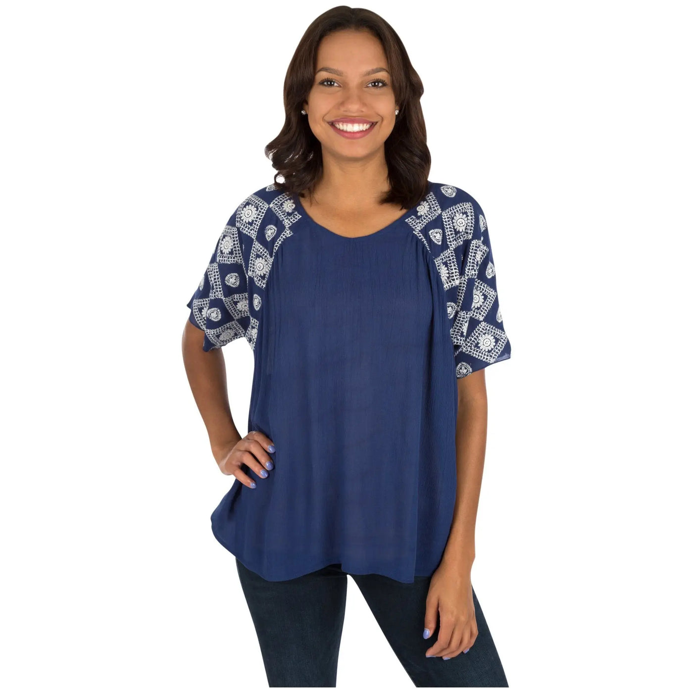 Navy blue top with white geometric embroidery on sleeves and shoulders called diamonds on my sleeve top