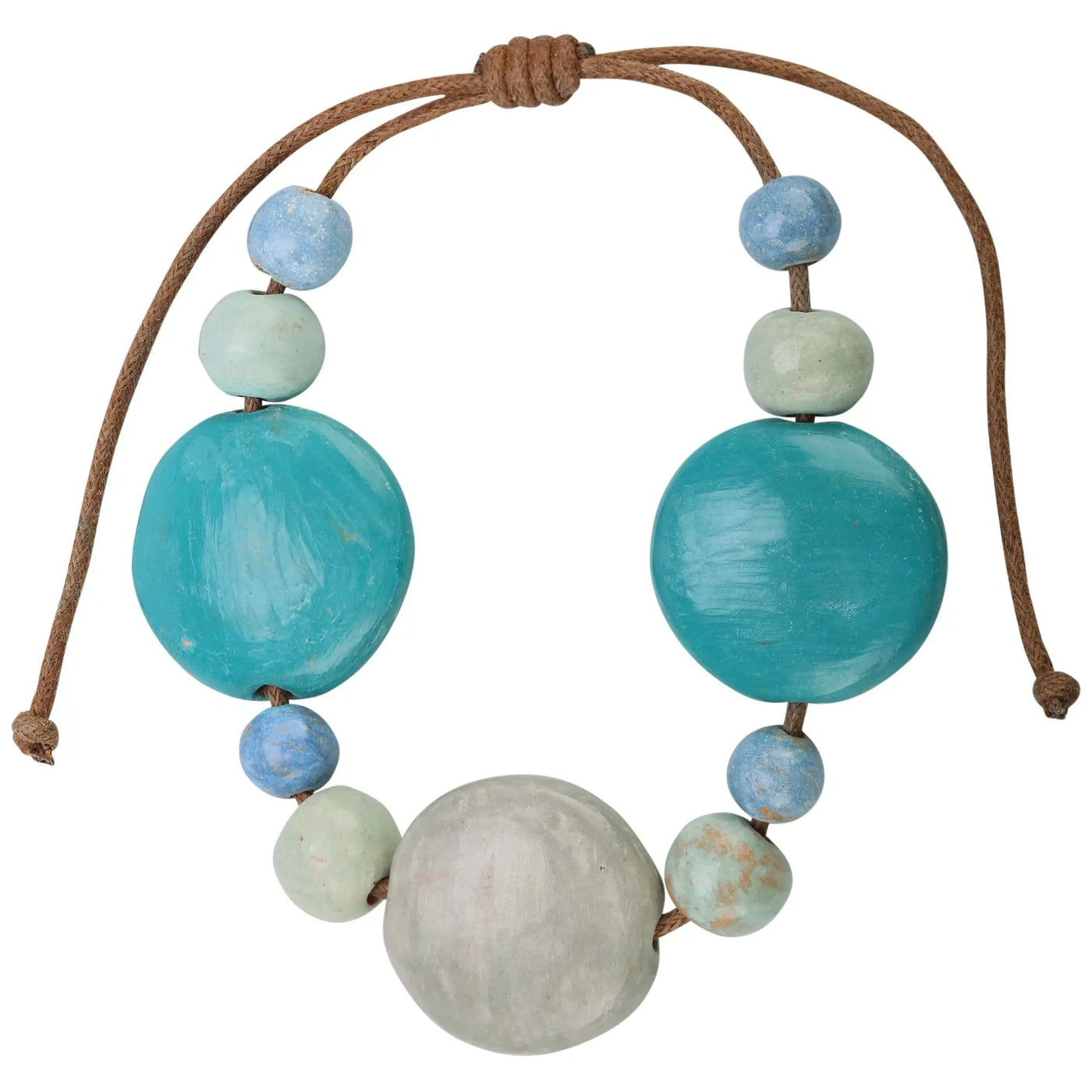 Honduran beaded sea bracelet handcrafted with turquoise light blue and muted green wooden beads on natural brown cord