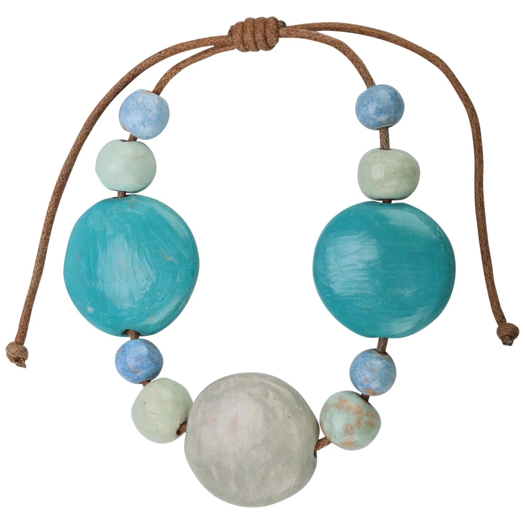 Honduran beaded sea bracelet handcrafted with turquoise light blue and muted green wooden beads on natural brown cord