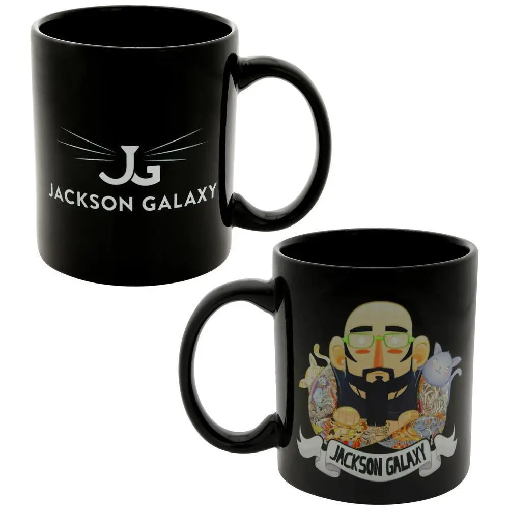 Black ceramic mug with white jg logo and colorful jackson galaxy cartoon surrounded by cats on one side