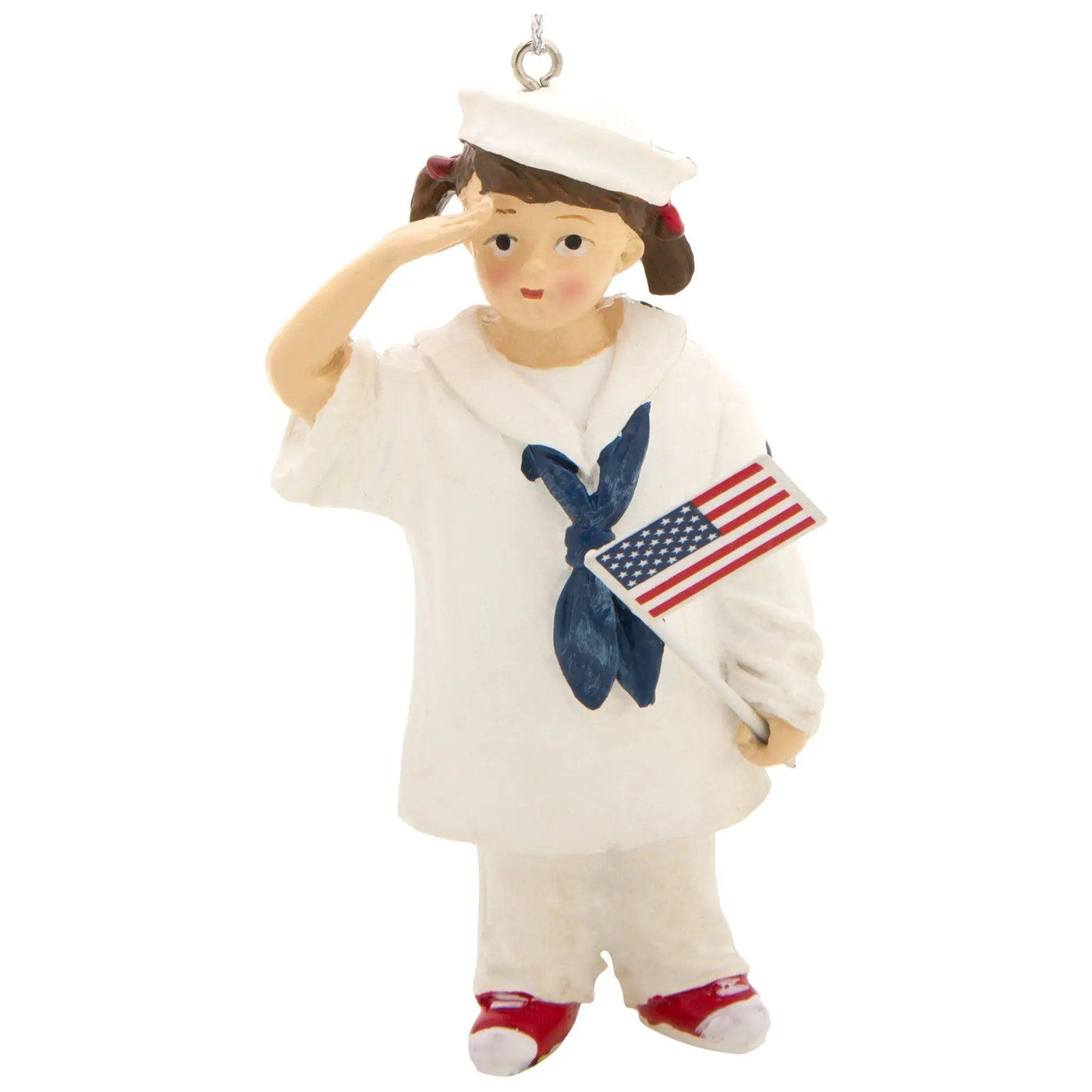 White porcelain sailor girl little heroes military branch ornament with red and blue accents holding american flag