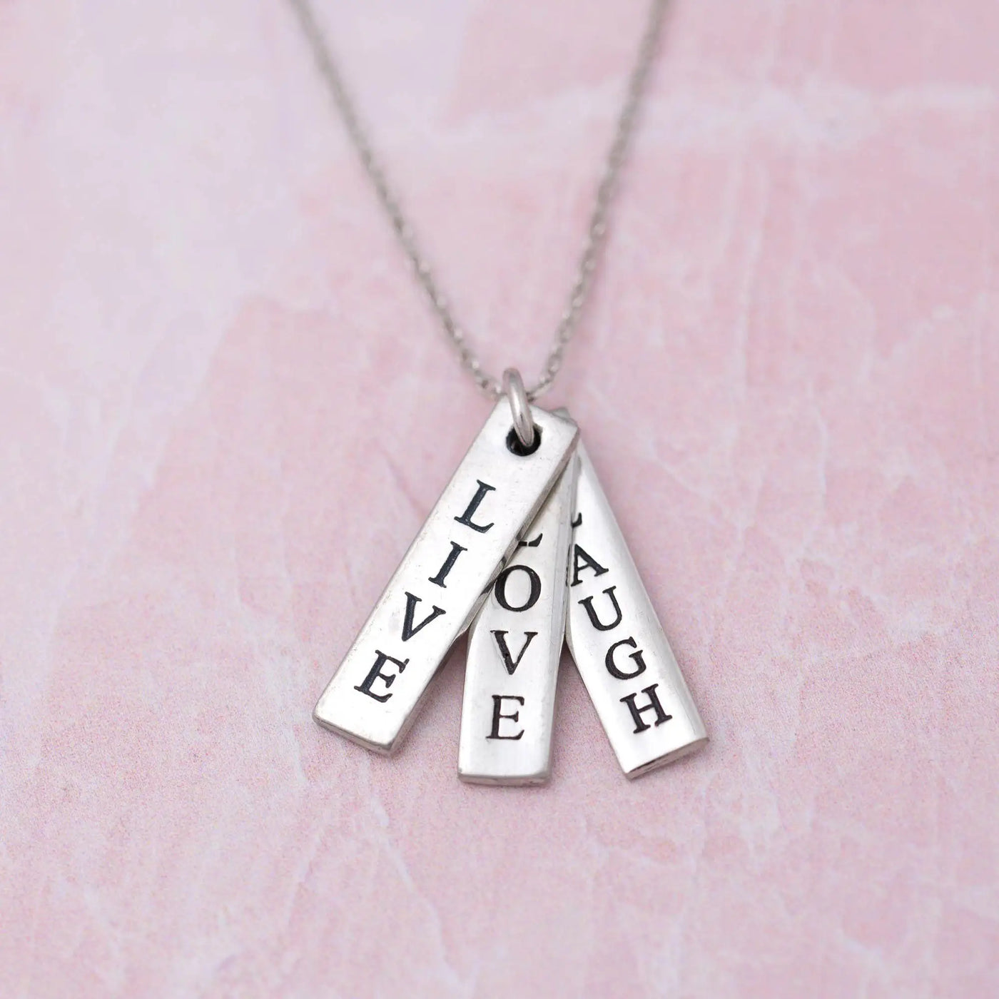 Silver live love laugh pewter necklace with three engraved rectangular tags for daily inspirational wear