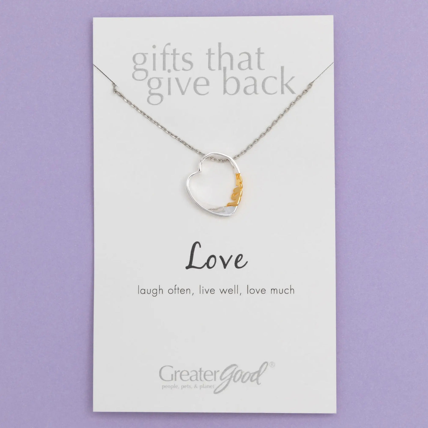 Silver heart-shaped pendant necklace with gold-toned cat silhouette on branded card sisterly love necklace