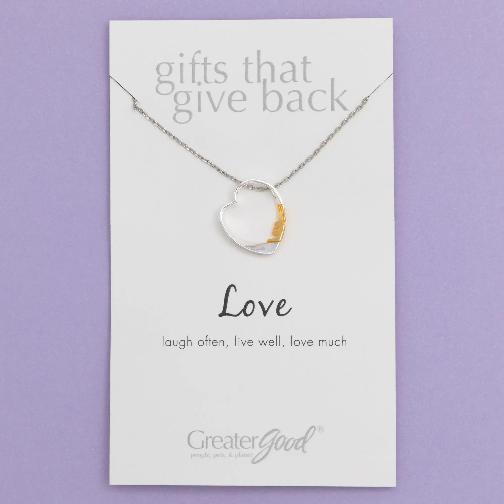 Silver heart-shaped pendant necklace with gold-toned cat silhouette on branded card sisterly love necklace