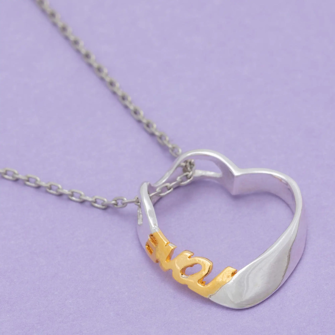 Silver and gold heart-shaped pendant necklace with you engraved in gold for sisterly love gift