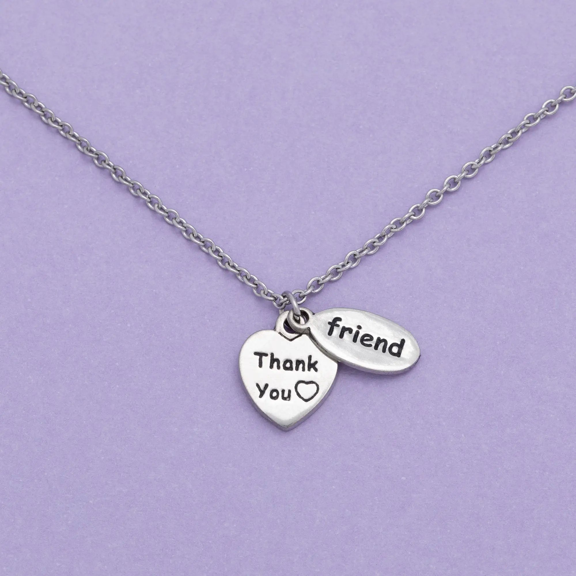 Silver sisterly love necklace with heart thank you charm and oval friend charm on delicate chain
