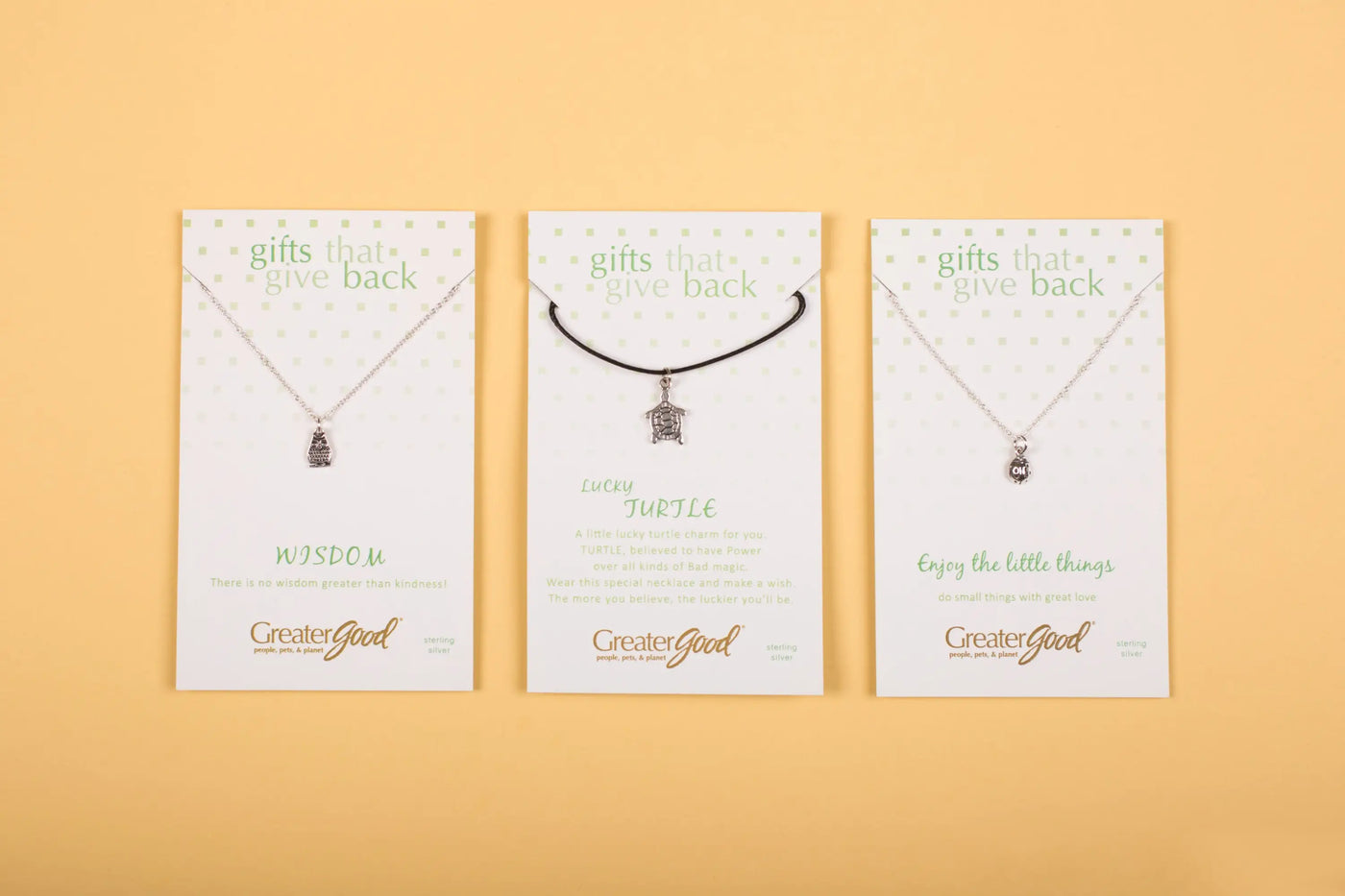Three silver toned wild at heart sterling necklaces with teardrop pendant turtle charm and small dangling pendant