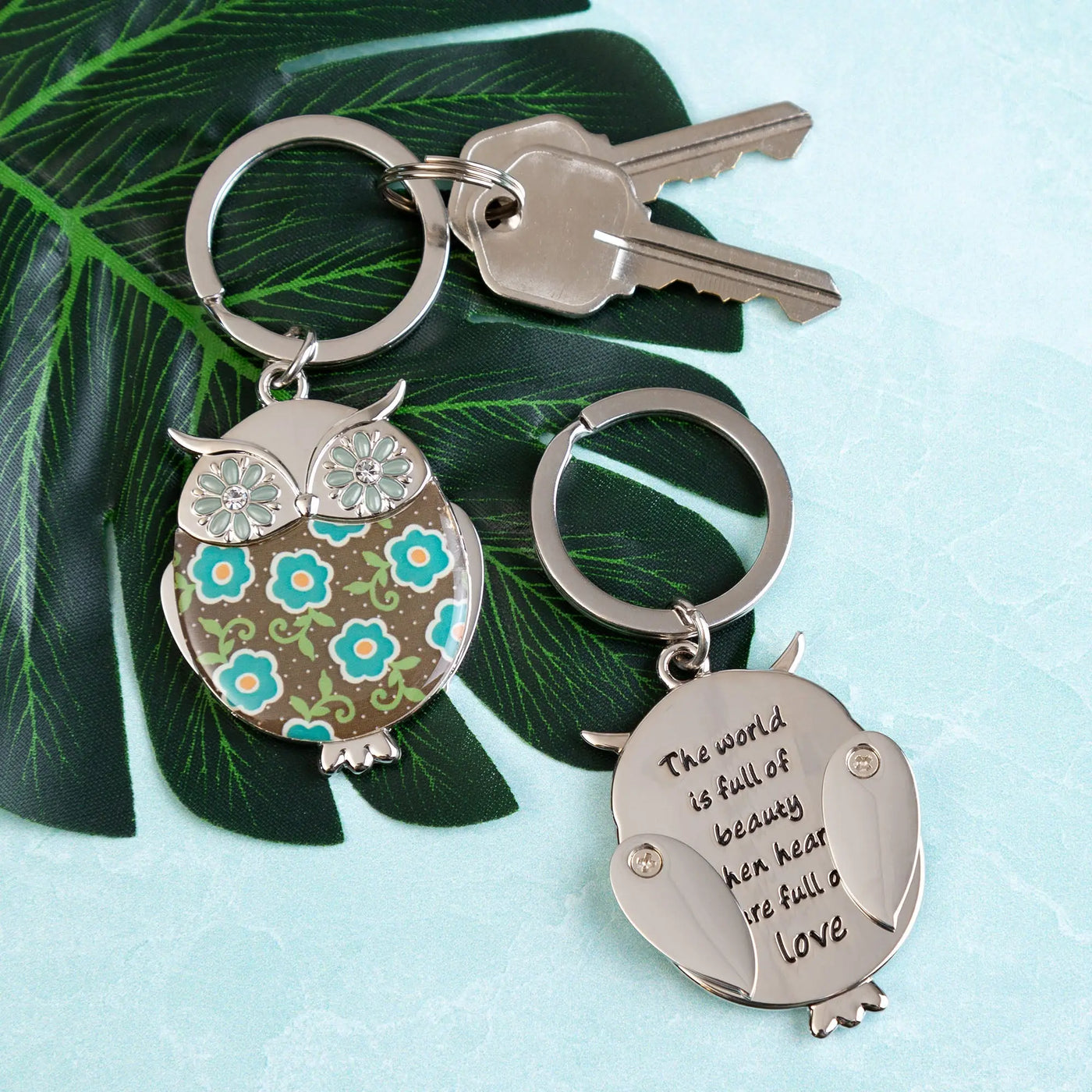 Silver owl keychain with floral pattern and gemstone eyes from wise in love collection